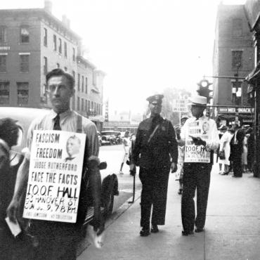 Jehovah's Witnesses Proselytize on a New England Street